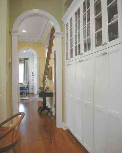 Pensacola:-Seville-Historic-District:-202-Cevallos-Street_13.jpg Pensacola:-Seville-Historic-District:-202-Cevallos-Street_13.jpg: cabinets, heart pine floors, staircase, dining room, kitchen, columns, arcade, arched doorway