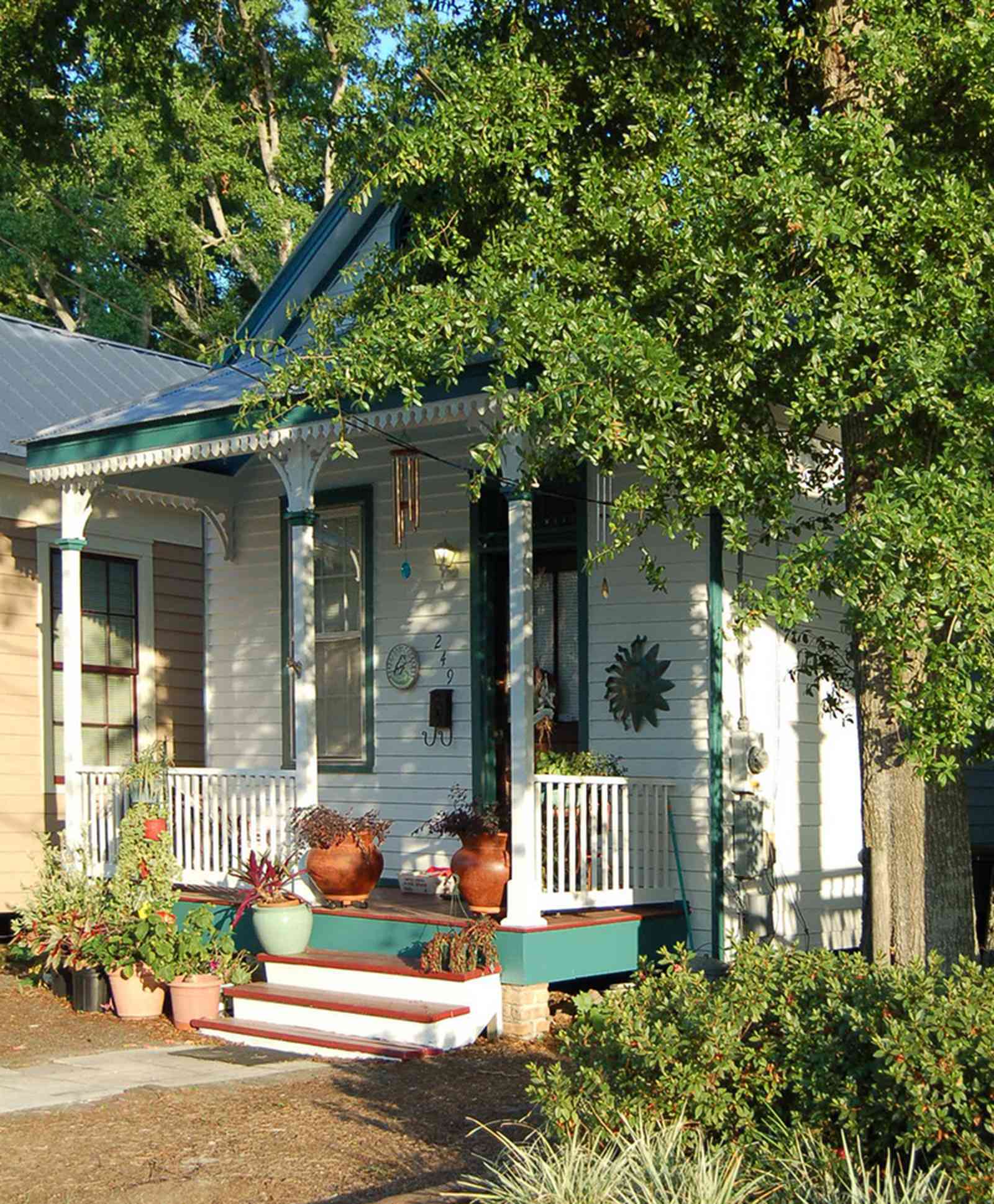 Risha_02+WEB.jpg:  shotgun house, victorian gingerbread, 