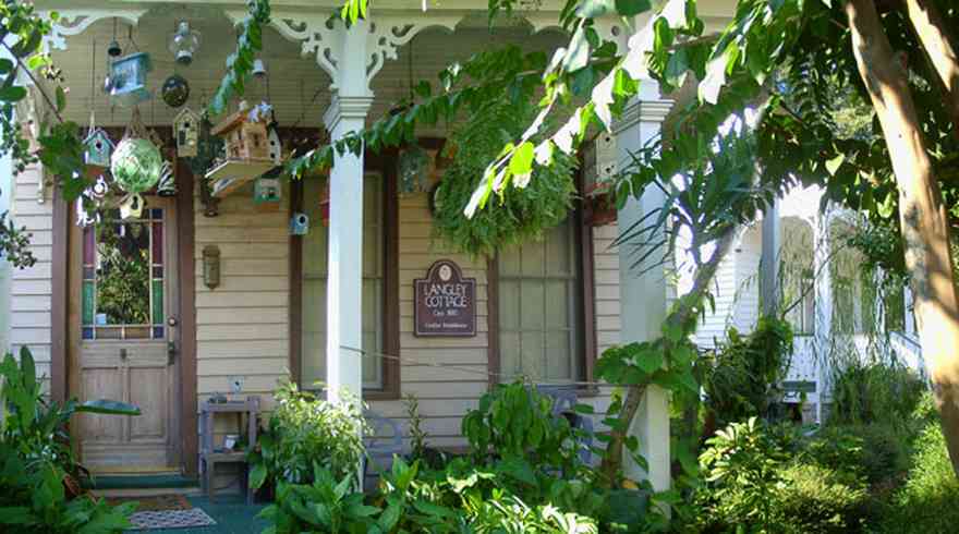 Pensacola:-Seville-Historic-District:-329-East-Intendencia-Street_01.jpg:  creole cottage, bird house, stained glass, shotgun cottage, gable roof, , , 