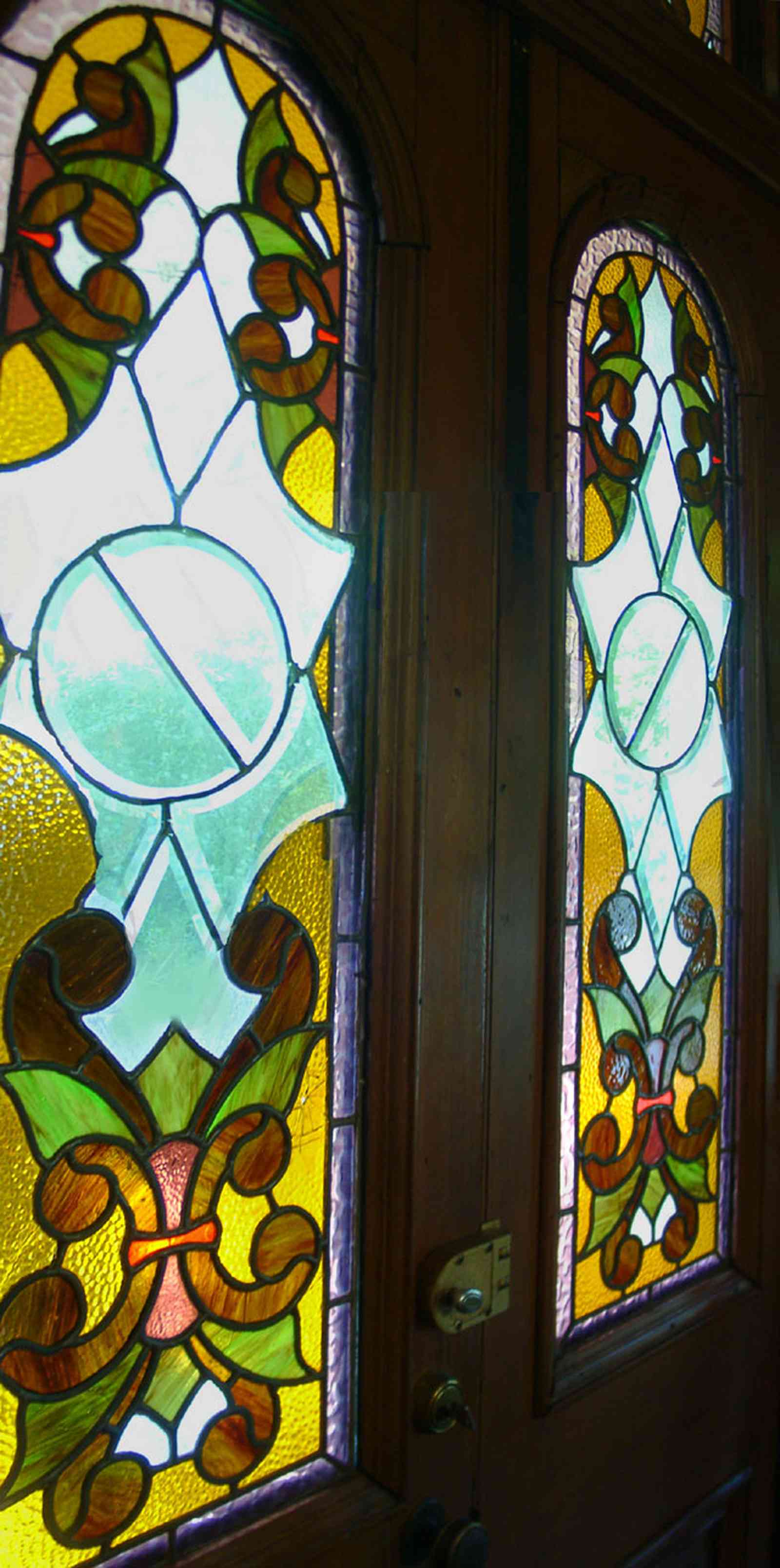 Pensacola:-Seville-Historic-District:-433-East-Zaragoza-Street_41.jpg:  victorian house, stained glass door