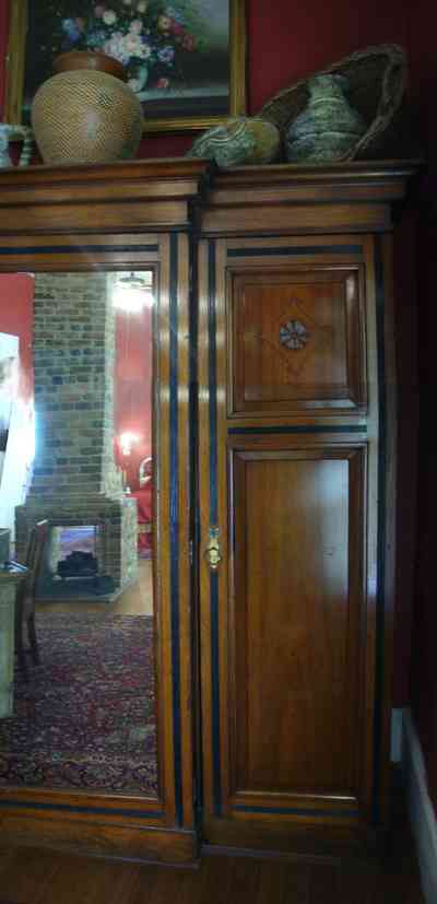 Pensacola:-Seville-Historic-District:-433-East-Zaragoza-Street_48.jpg:  victorian house, armoire, fireplace, 