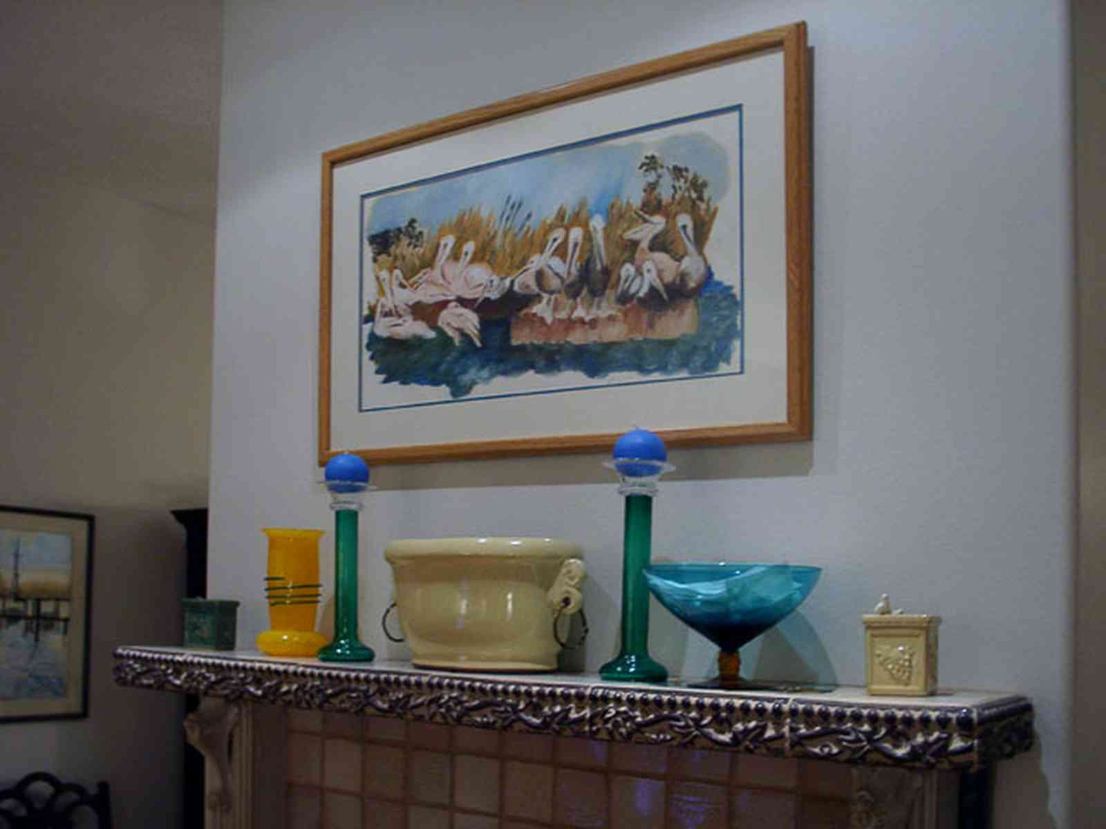 Pensacola:-Seville-Historic-District:-529-East-Government-Street_14.jpg:  mantel, fireplace, ceramic sculture, living room, oil painting