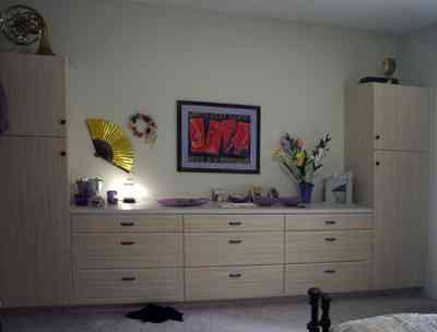 Pensacola:-Seville-Historic-District:-529-East-Government-Street_23.jpg:  bedroom, posters, built-in dresser