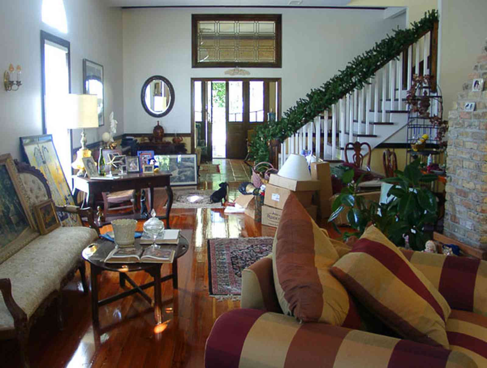 Pensacola:-Seville-Historic-District:-BW-Properties_11.jpg:  shotgun architectural style, staircase, folk victorian house, sofa fireplace