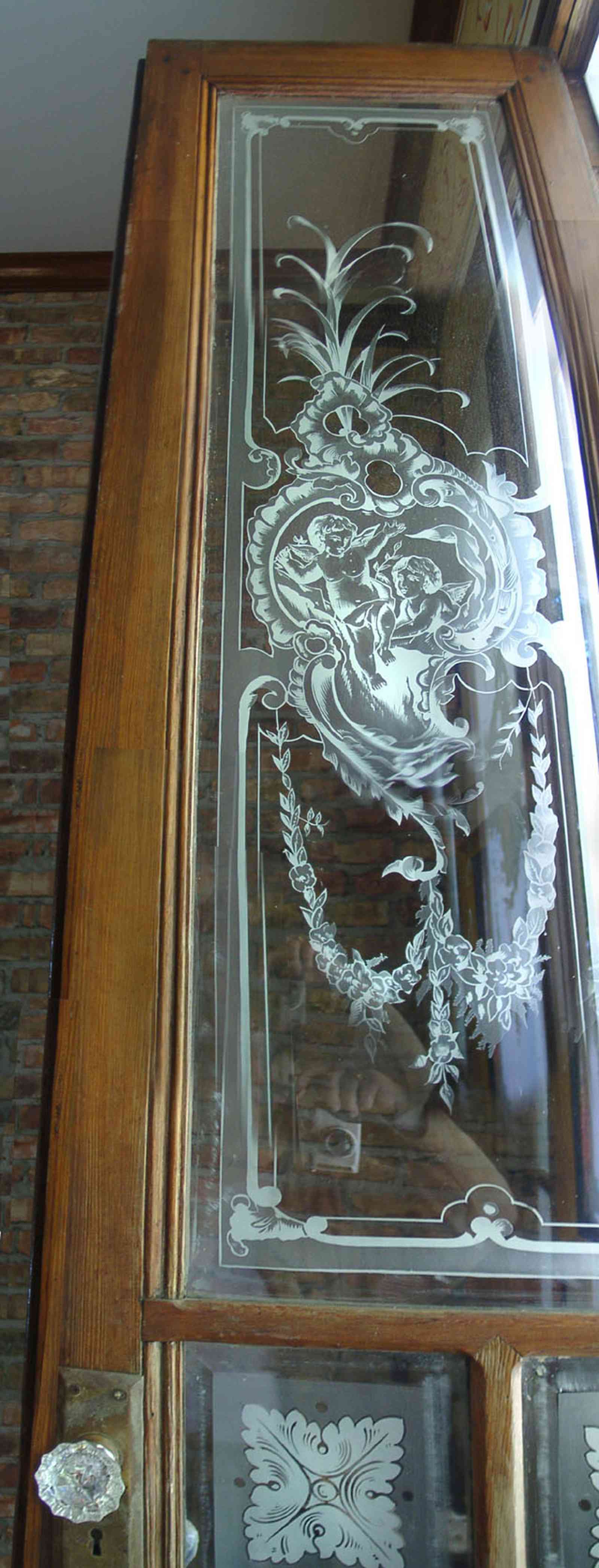 Pensacola:-Seville-Historic-District:-BW-Properties_20.jpg:  etched glass door panel, cafe doors, glass door knob