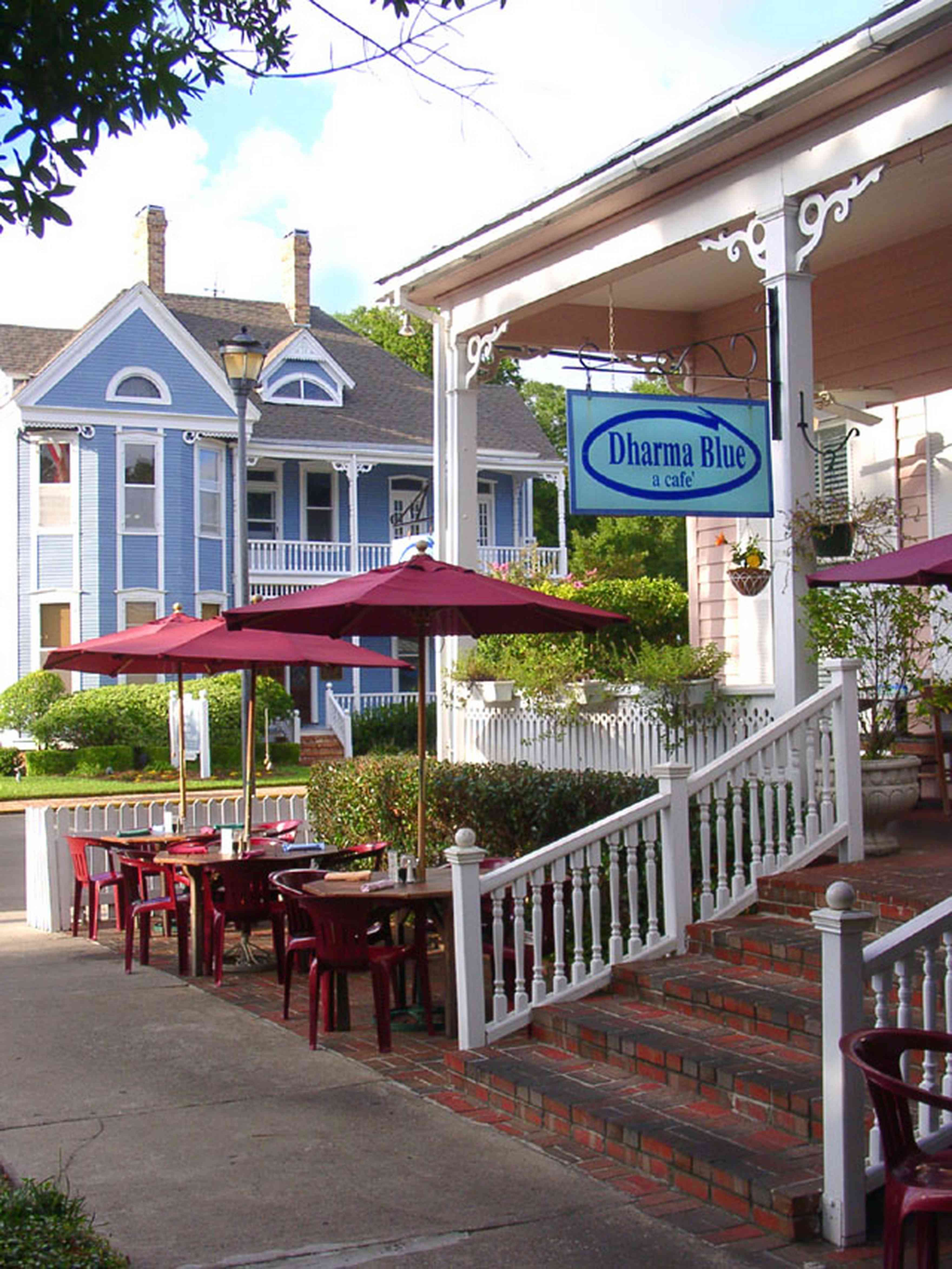 Pensacola:-Seville-Historic-District:-Dharma-Blue-Restaurant_01.jpg:  restaurant, sidewalk cafe, umbrella, victorian home