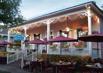 Pensacola:-Seville-Historic-District:-Dharma-Blue-Restaurant_02.jpg:  christmas decoratiions, garland, restaurant,petunias