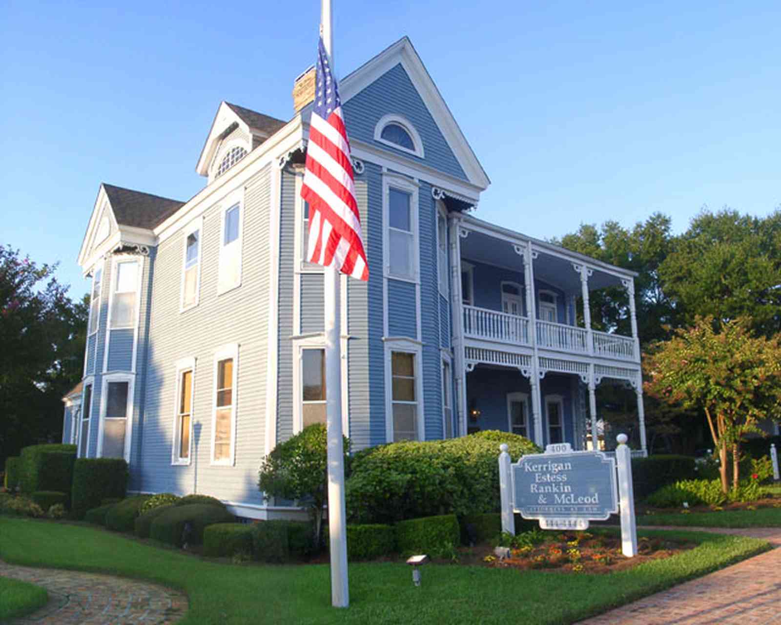 Pensacola:-Seville-Historic-District:-Kerrigan,-Estees,-Rankin,-McLeod-Law-Offices_00.jpg:  american flag, victorian house, law office