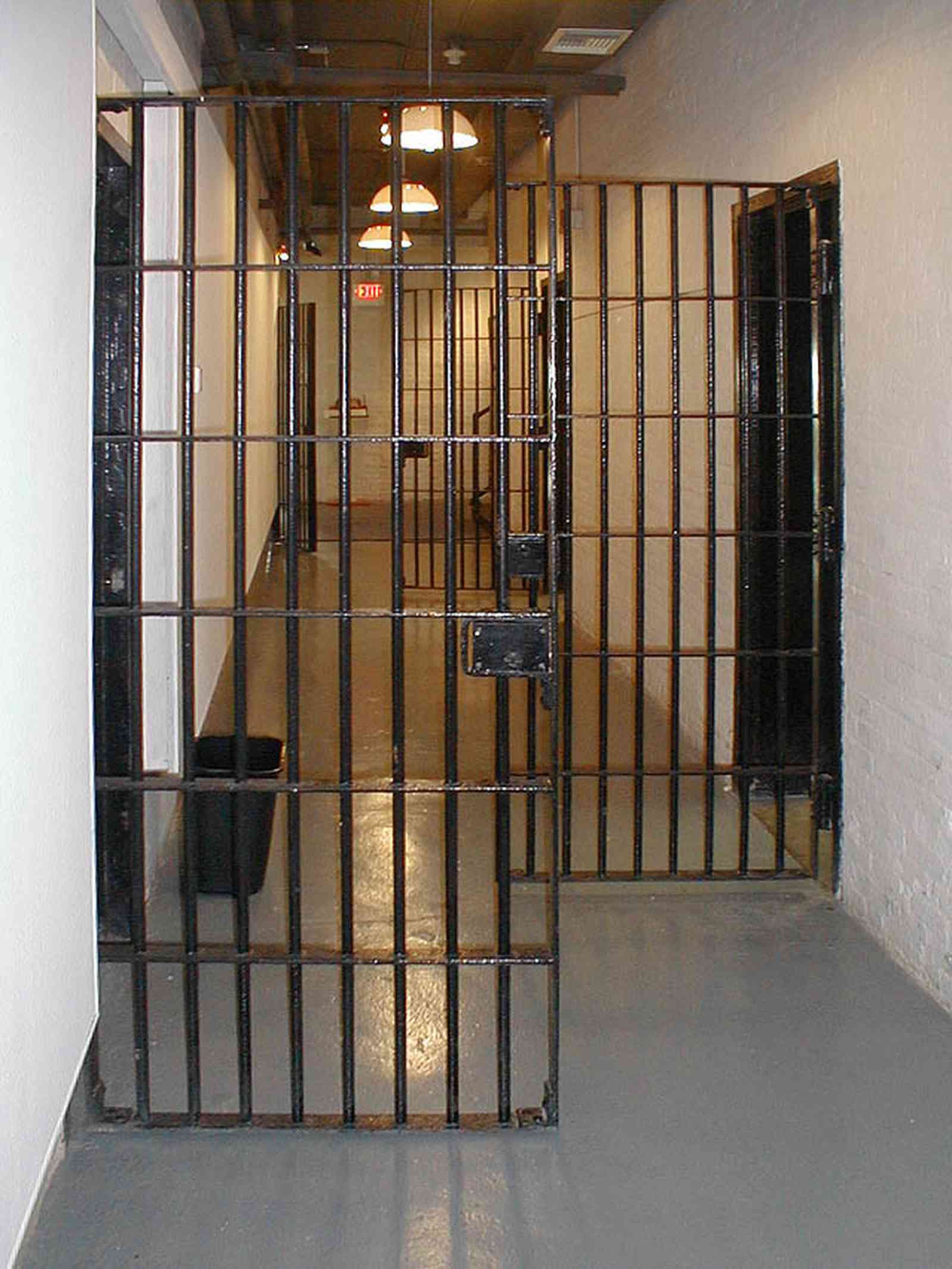 Pensacola:-Seville-Historic-District:-Old-City-Jail_02.jpg:  prisoner, jail, behind bars, barred windows, police department, city court, spanish revival building, pensacola museum of art