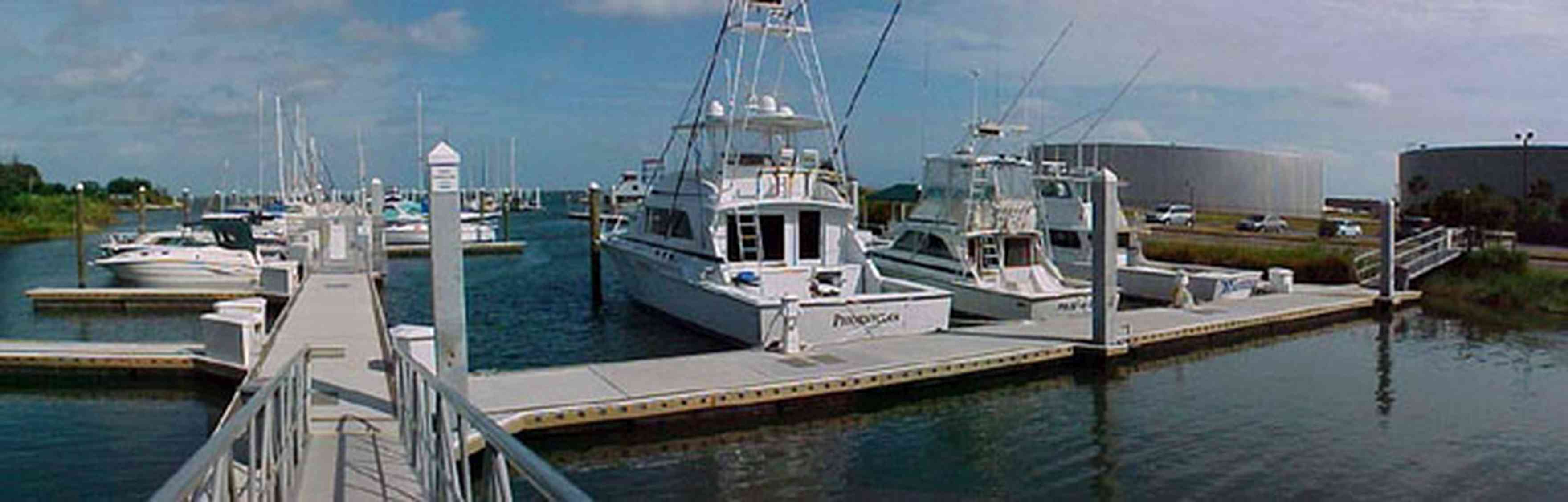 Pensacola:-Seville-Historic-District:-Pitt-Slip_01.jpg:  port of pensacola, dock, pier, yacht, storage tanks