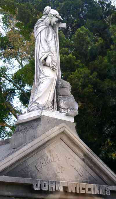 Pensacola:-Seville-Historic-District:-St-Michael-Cemetery_15.jpg:  cemetery, raised crypt, tomb, statue, marble