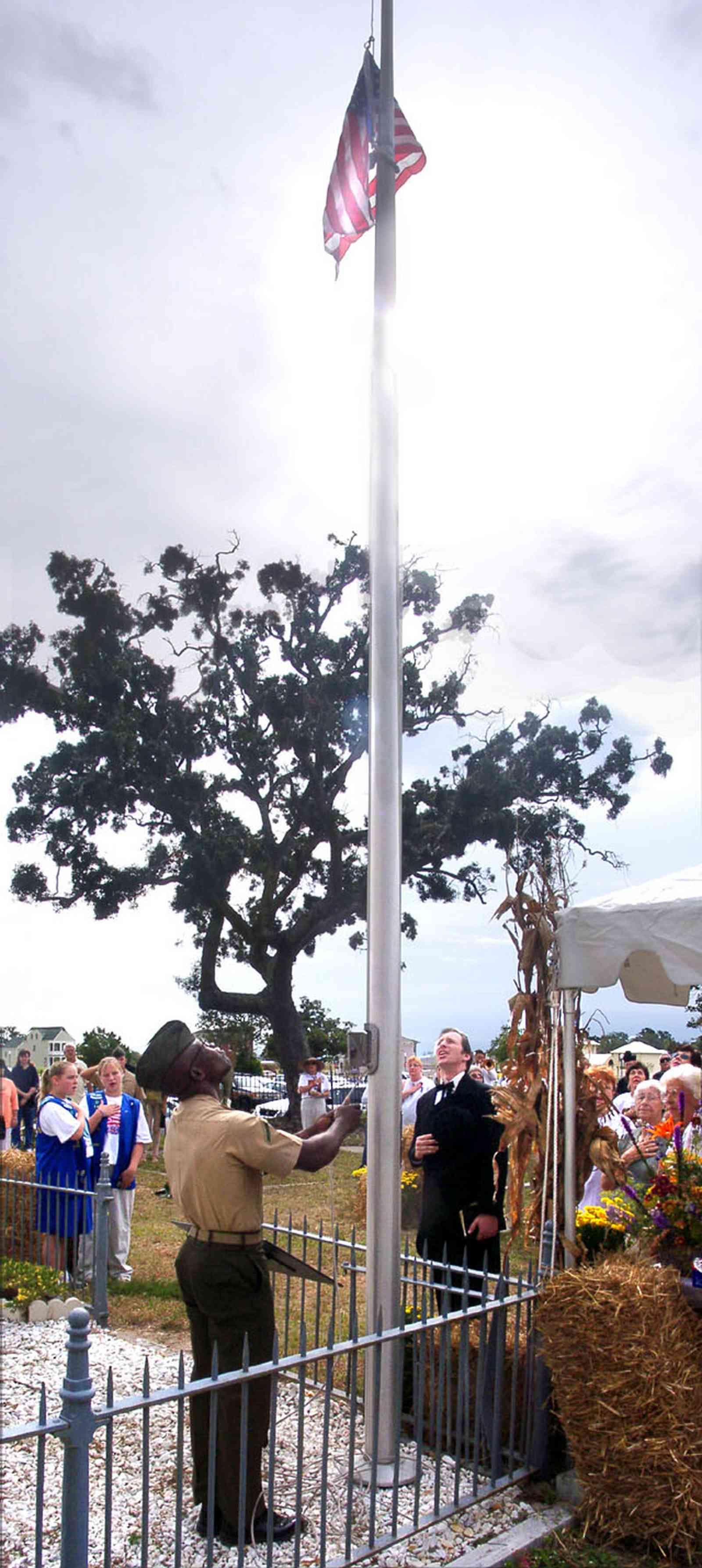 Pensacola:-Seville-Historic-District:-St-Michael-Cemetery_21.jpg:  cemetery, pledge of alligance, flag raising