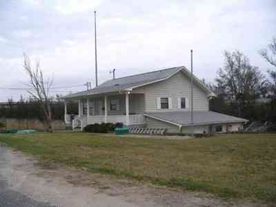Pensacola:-Swamp-House_13.jpg Pensacola:-Swamp-House_13.jpg: road, house, swamp, bleak,