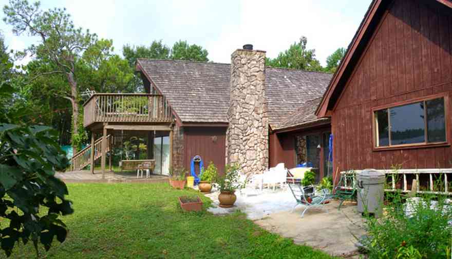Peterson-Point:-Cobb-House_04.jpg Peterson-Point:-Cobb-House_04.jpg: balcony, deck, stone chimney, house, home,