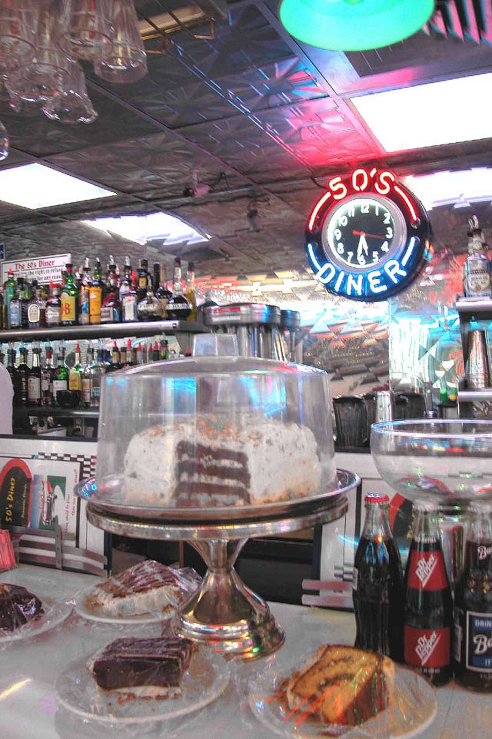 Pine-Forest:-50s-Diner_05.jpg:  cake plate, neon, clock, stainless steel, diner, malts, hamburgers