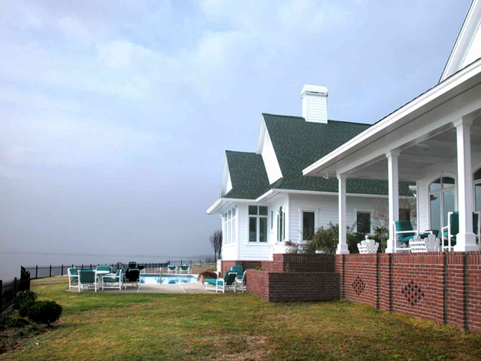 Sanders-Beach-585-Windrose_02+web.jpg:  waterfront home, gabled roof, 