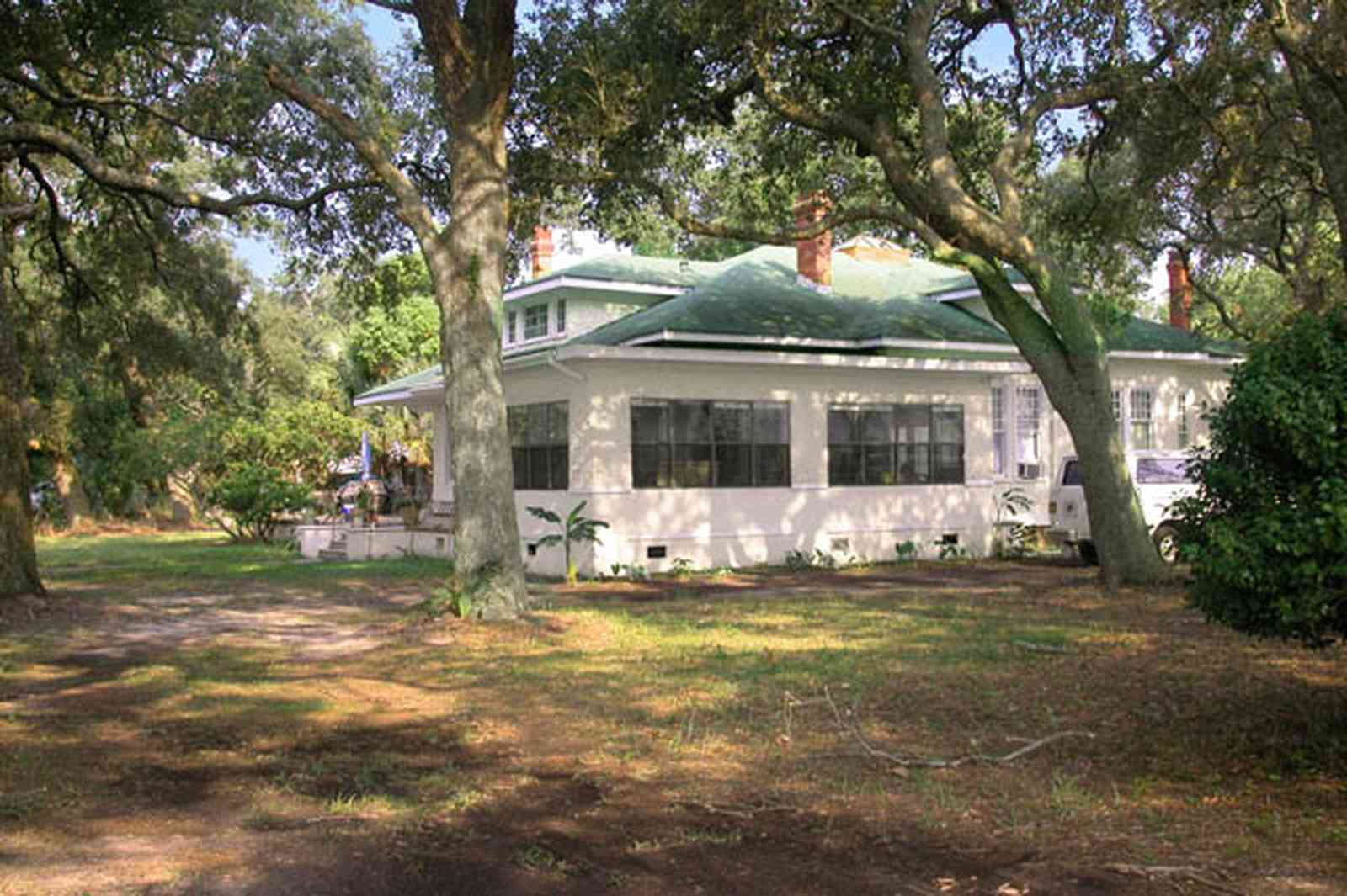 Sanders-Beach:-Cypress-Street-House_03.jpg:  oak trees, waterfront home, bay view, bay front, water view, stucco home