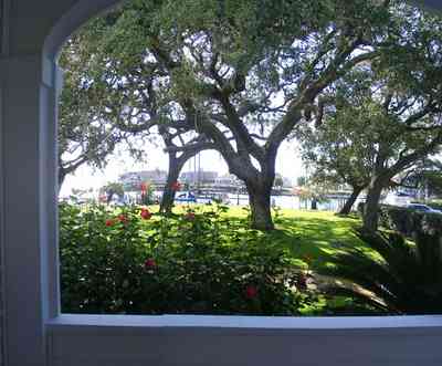 Sanders-Beach:-Pensacola-Yacht-Club_01c.jpg:  oak tree, hibicus, escambia bay, porch