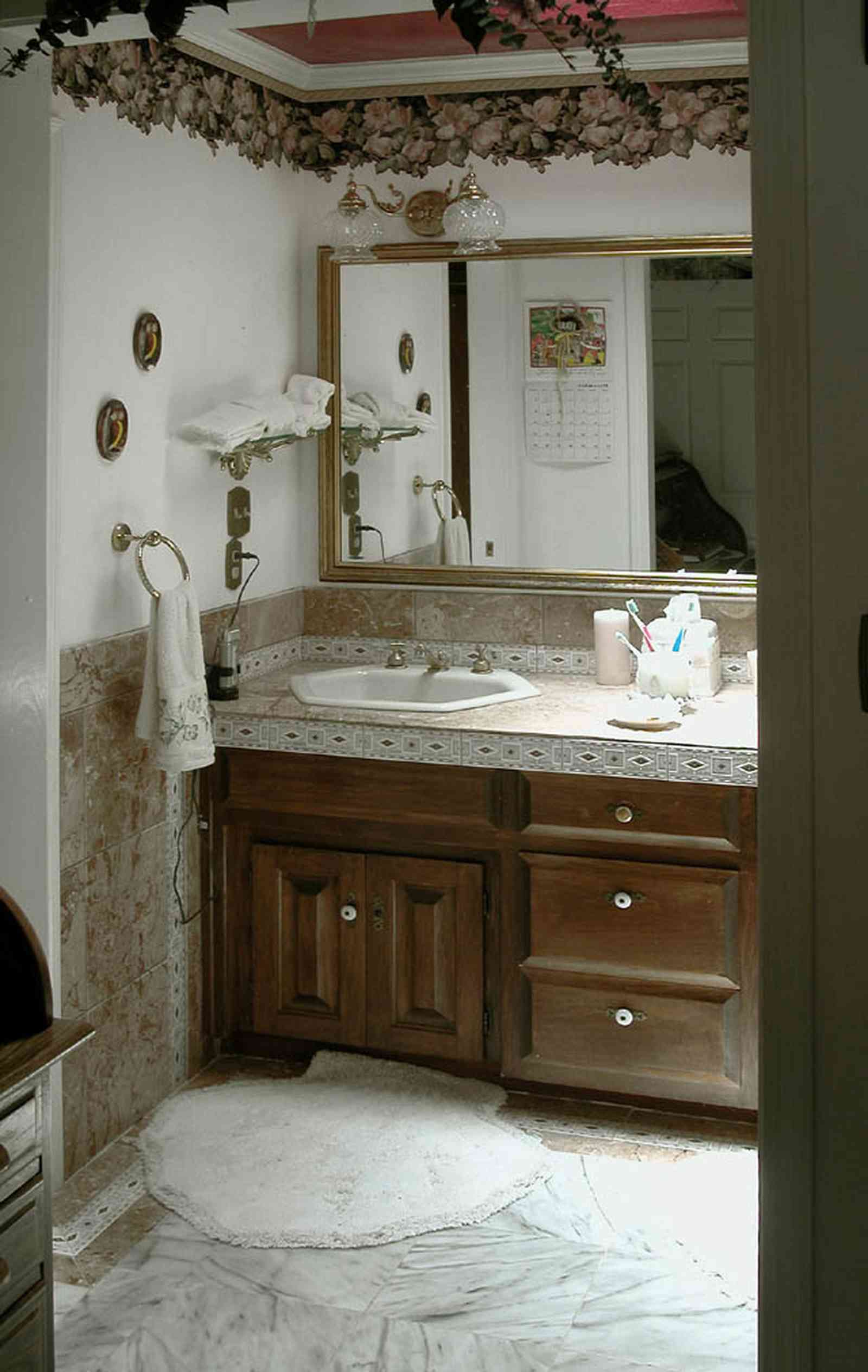 Scenic-Highway:-3780-Scenic-Ridge-Drive_10.jpg:  bathroom, cabinet, marble floor, mirror, floral wallpaper border