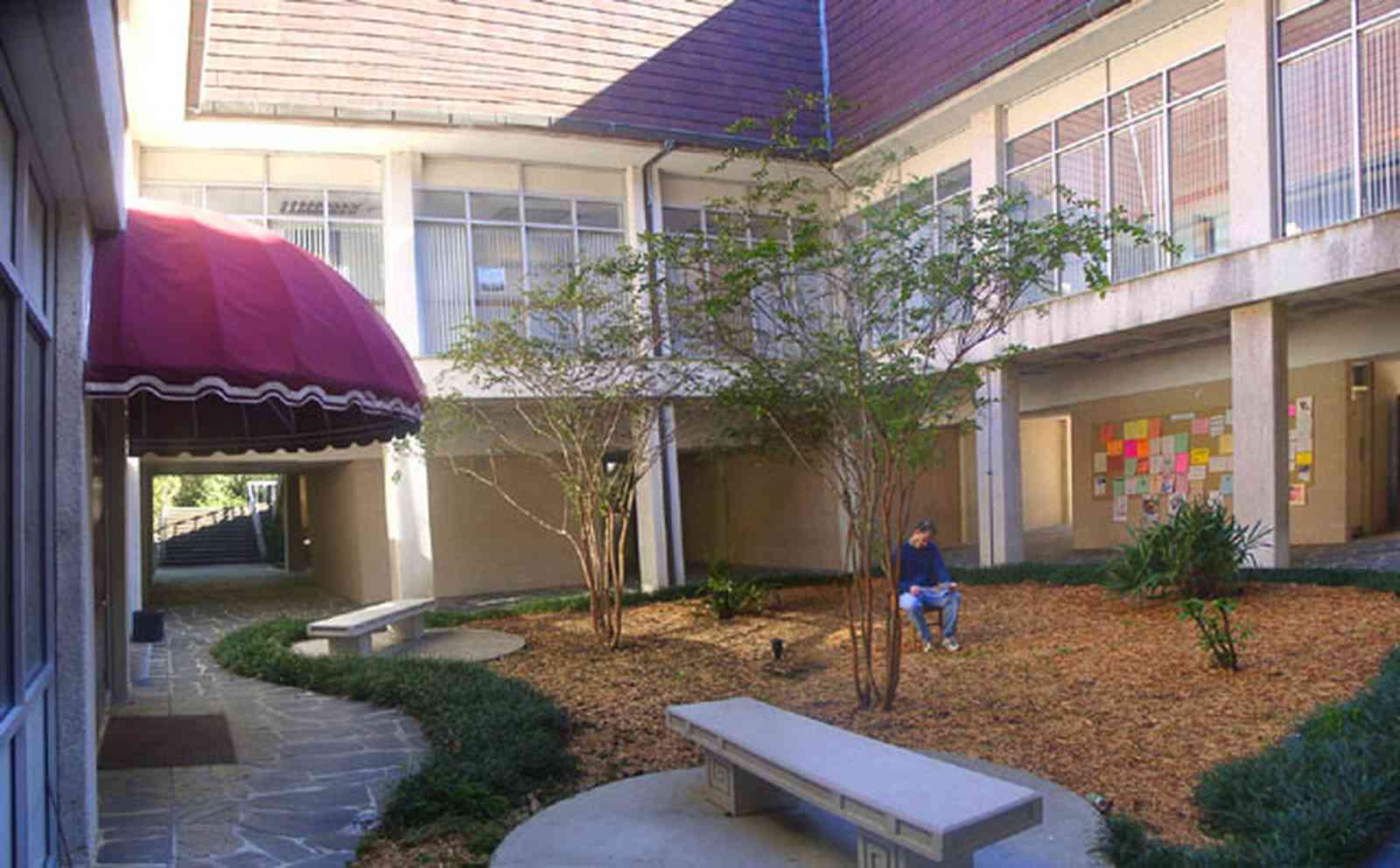 University-Of-West-Florida:-Campus_03.jpg:  dorm building, bench, campus, student, university