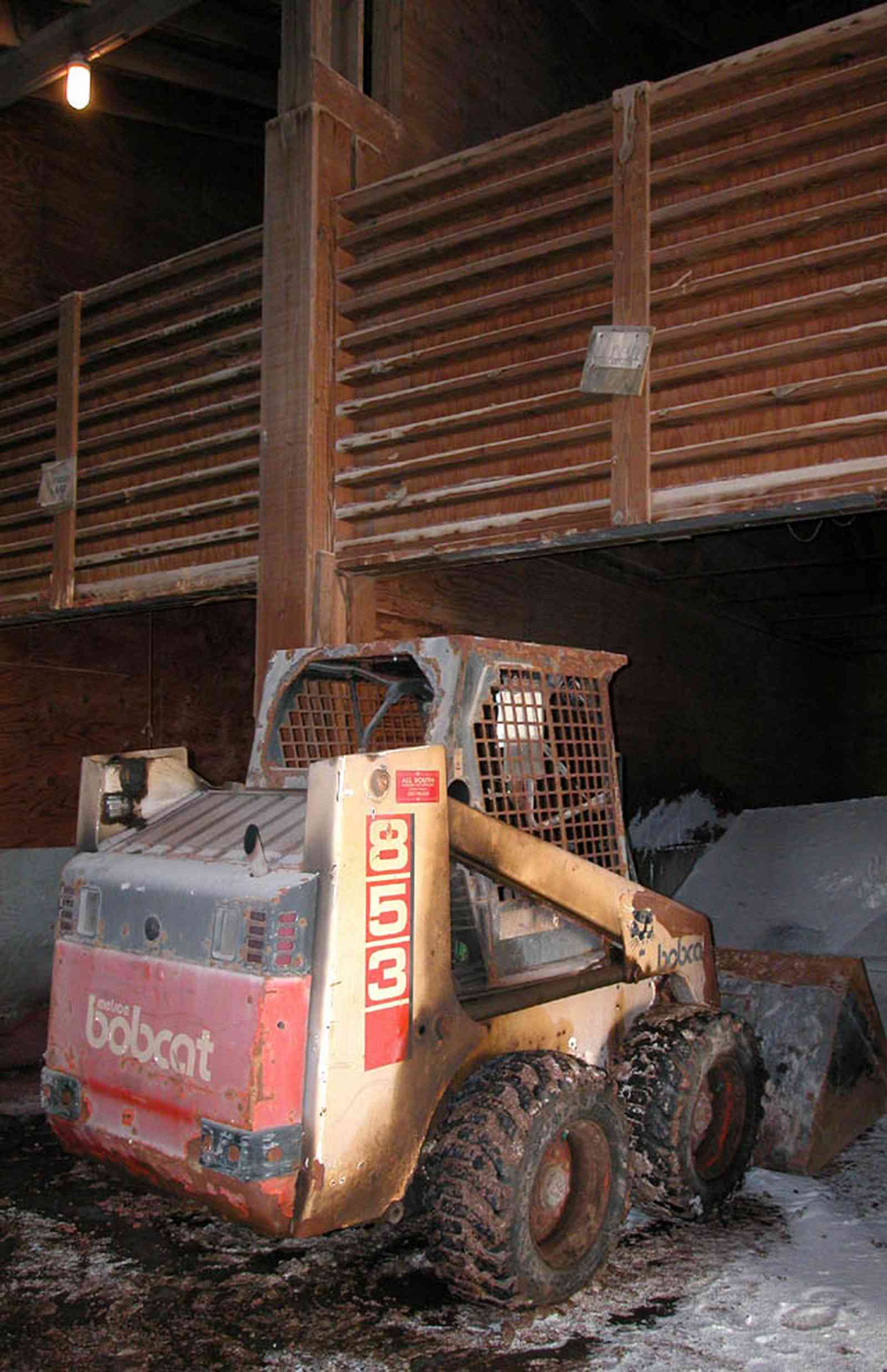 Walnut-Hill:-Escambia-Grain-Corp_10.jpg:  grain elevator, wheat, corn, soy beans, tower, loading dock, farmers, bobcat tractor, mixing fertilizer, seed, fertilizer