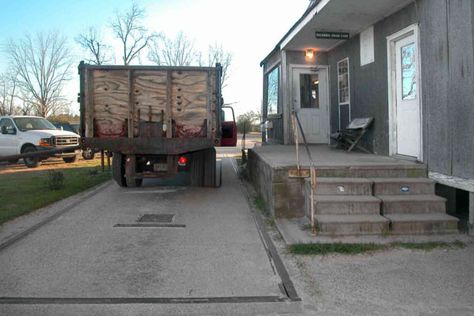 Walnut-Hill:-Escambia-Grain-Corp_14.jpg:  grain elevator, wheat, corn, soy beans, tower, loading dock, farmers, office, weigh-in, chevy truck, seed, fertilizer