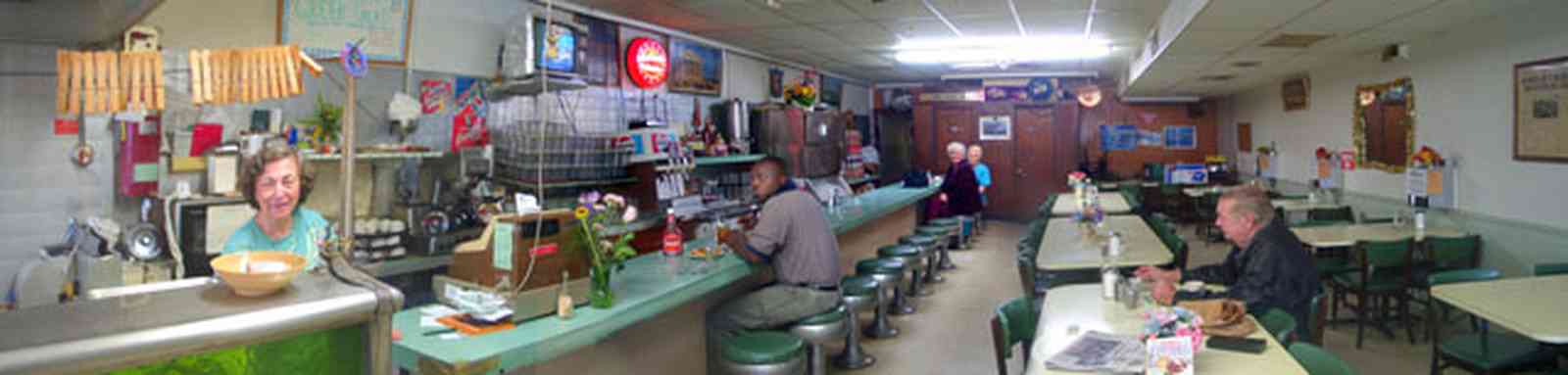 Warrington:-Bills-Fine-Foods_2.jpg:  restaurant, homestyle cooking, counter, stools, informal dining