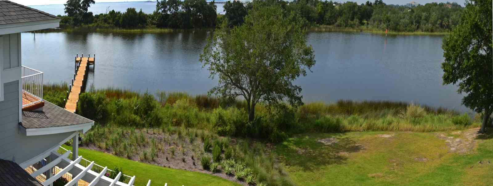 400+LaRua+Landing-3rd+floor+porch+facing+Bayou+Texar_02.jpg:  trellis, Bayou Texar, dock, pier, Coastal home, 