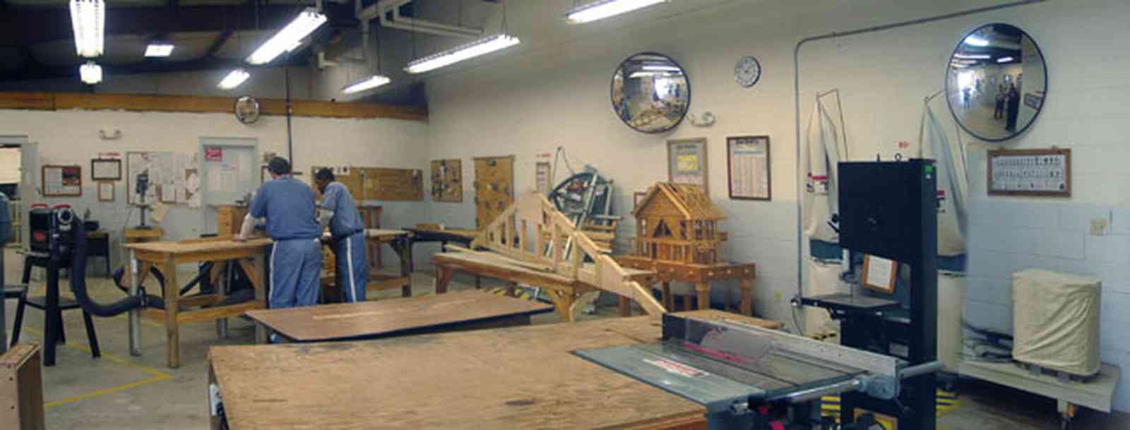 Century:-Prison_14.jpg:  prison workshop, wood, saw, century, guard, prisoner