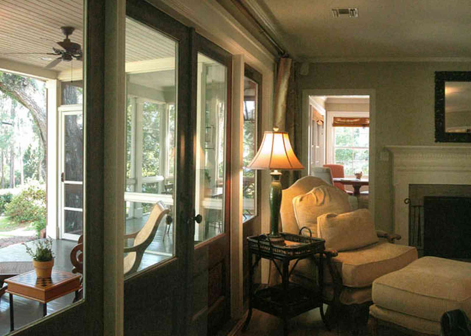 East-Hill:-2109-Whaley-Drive_20.jpg:  front porch, ceiling fan, easy chair, fireplace