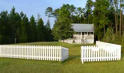 Milton:-Adventures-Unlimited_25.jpg:  cottage, victorian home, picket fence, park, lodge