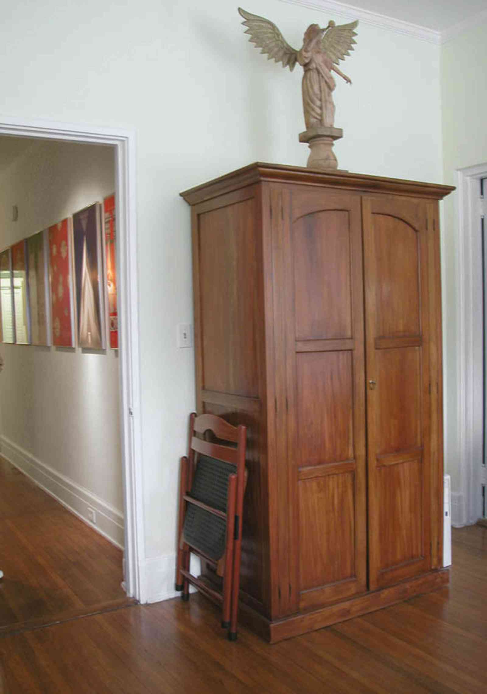 North-Hill:-123-West-Lloyd-Street_34.jpg:  guest bedroom, armoire, heart pine floors, 