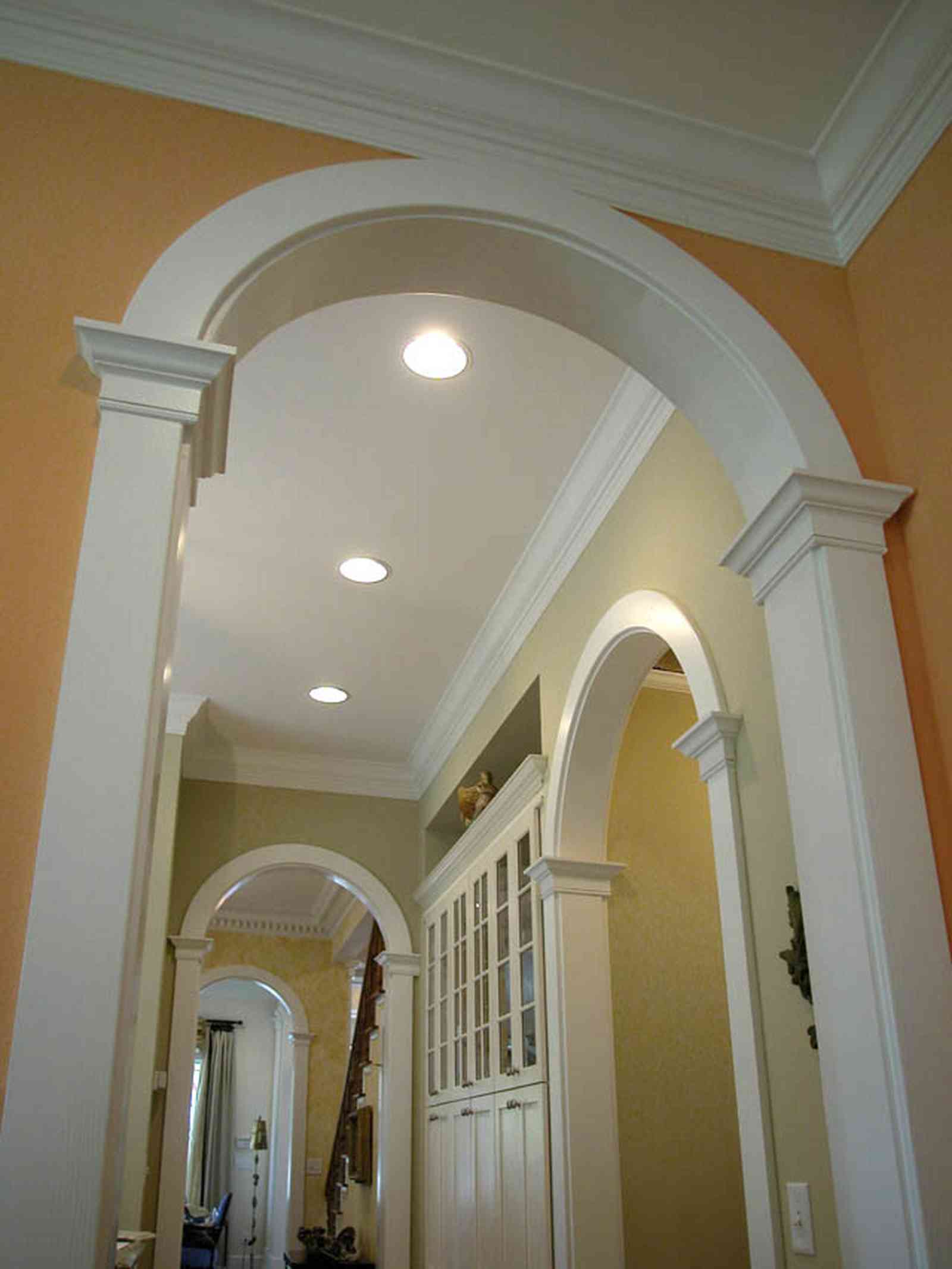Pensacola:-Seville-Historic-District:-202-Cevallos-Street_22.jpg:  arcade, arches, hallway, kitchen cabinets, ceiling
