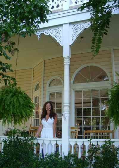 Pensacola:-Seville-Historic-District:-BW-Properties_01.jpg:  victorian front porch, bannister, folk victorian, gingerbread trim