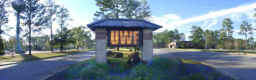 University-Of-West-Florida:-Campus_33.jpg:  university, sign, drive, pine trees